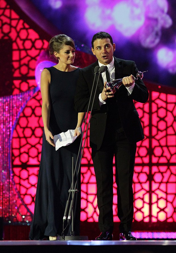 Ryan Thomas and Paula Lane collect the Serial Drama Performance on behalf of Katherine Kelly during the 2012 NTA Awards