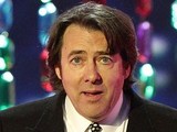 Jonathan Ross collects the Special Recognition award on stage during the 2012 NTA Awards