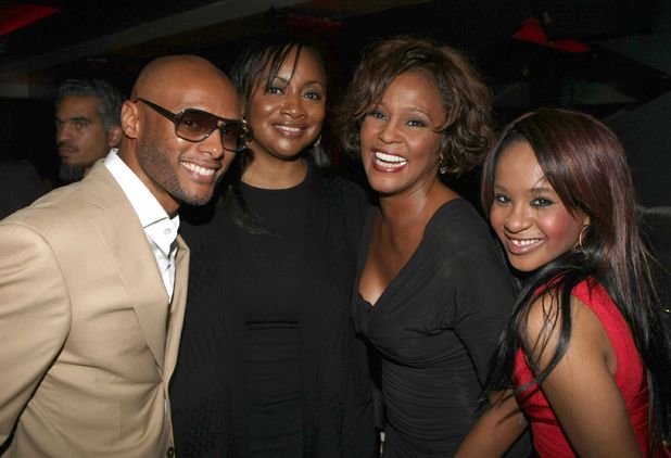 Whitney Houston with Kenny Lattimore, Patricia Houston, and daughter Bobbi Kristina, 2 days before her death