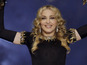 Madonna's single download sales discounted