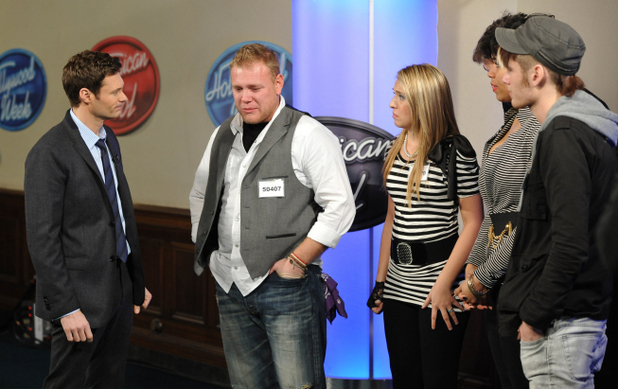Ryan Seacrest with contestants in American Idol Hollywood Week