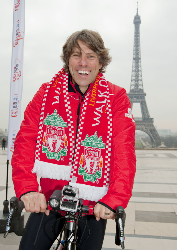 John wearing a Liverpool scarf