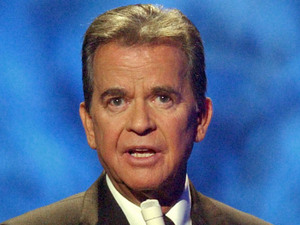 Dick Clark on the American Bandstand television show as he introduces Michael Jackson on stage for the show's 50th anniversary special