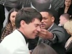 Will Smith slaps reporter for kissing him - video