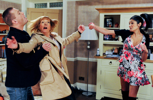 Alicia Gallagher (Natalie Anderson) hits Val Pollard (Charlie Hardwick)