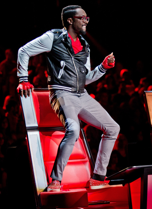 Will.i.am enjoys his team's performance.
