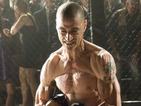 The actor has undergone a physical transformation to play a cage fighter. 