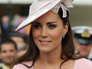 Kate Middleton, The Duchess of Cambridge meets guests during a garden party at Buckingham Palace, London.