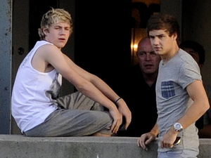 Niall Horan and Liam Payne relaxing backstage at the Molson Amphitheatre in Toronto ahead of the One Direction concert