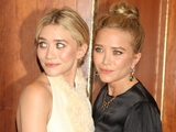 The Olsen twins Mary-Kate and Ashley pose for photographs at The Fresh Air Funs Salute To American Heroes in New York