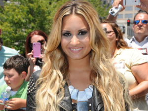 Demi Lovato arrives.