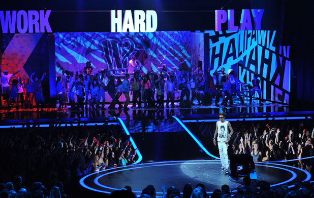 Wiz Khalifa takes to the MTV Movie Awards stage - with a lot of dancers in tow