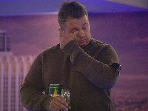 Big Brother 2012 Day 8: Chris keeps his beer close to his chest.