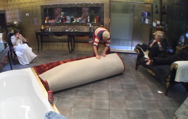 Big Brother Day 7: Scott rolls Becky up in the rug.