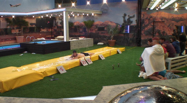 Housemates watching Luke A in the 'final throw-down' task