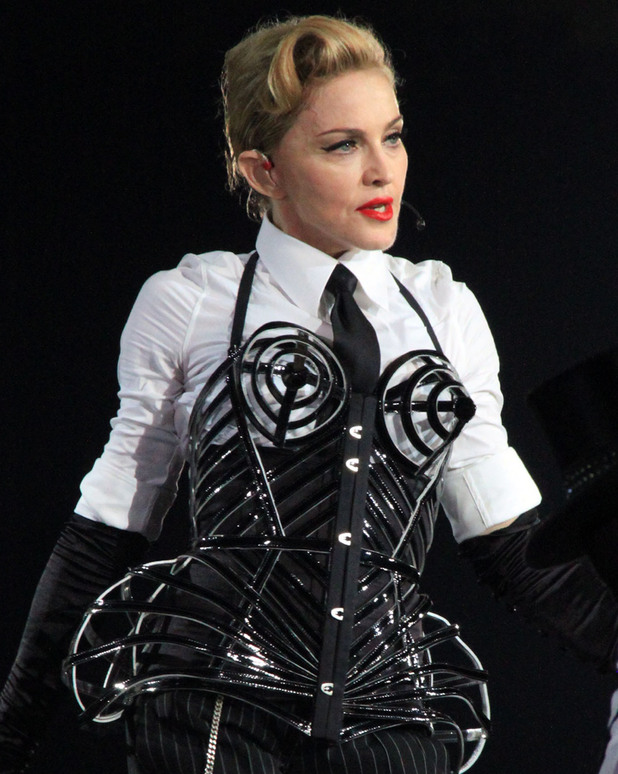 Madonna
performs on stage as part of her MDNA world tour
Milan, Italy