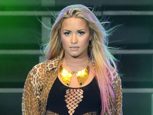 Demi Lovato
performs at the Molson Canadian Amphitheatre during her 'Unbroken' tour.
Toronto, Canada