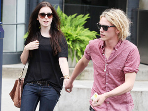 Lily Collins and her 'The Mortal Instruments' co star Jamie Cambell Bower hold hands as they leave their residence to grab Starbucks before heading out to an outdoor patio.
Toronto, Canada 