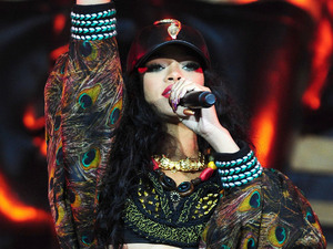 Rihanna on stage at Wireless Festival. Singer has confirmed she will design a collection for River Island.