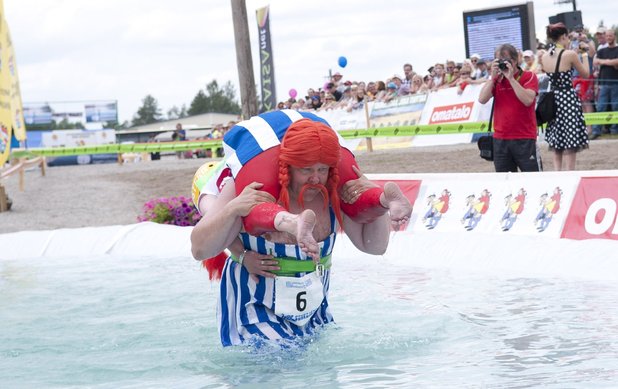 World Championship wife-carrying competition in Sonkajarvi, Finland