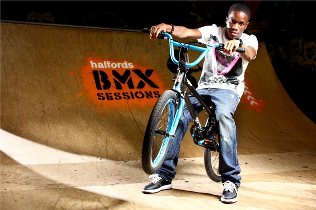 Tinchy Stryder riding a BMX