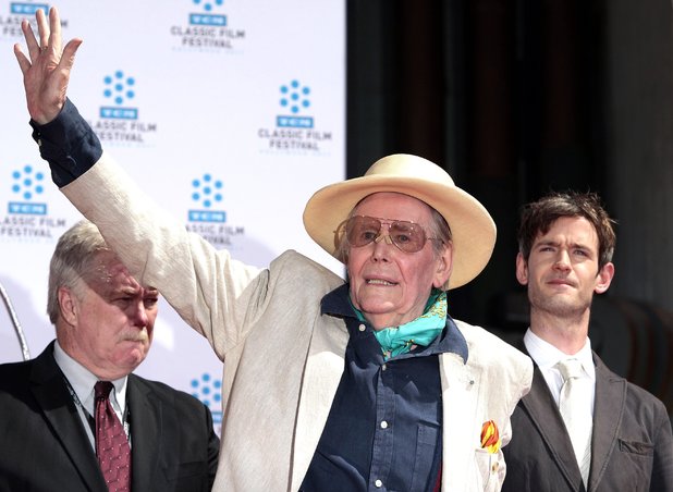 Actor Peter O'Toole, centre, waves to fans with his son Lorcan O'Toole to the right. O'Toole is honored during the TCM Classic Film Festival at Grauman's Chinese Theatre on Saturday, April 30, 2011, in Los Angeles. 