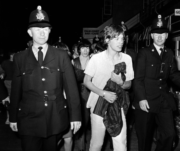 Mick gets a police escort