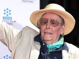 Actor Peter O'Toole, centre, waves to fans with his son Lorcan O'Toole to the right. O'Toole is honored during the TCM Classic Film Festival at Grauman's Chinese Theatre on Saturday, April 30, 2011, in Los Angeles.