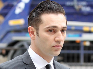 Amy Winehouse's former boyfriend Reg Traviss appears at Westminster Magistrates' Court where he is charged with two counts of rape