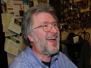 Tom Davis, Emmy-winning Saturday Night Live writer, who has died aged 59. He is pictured with friend and fan Mary Duffy.