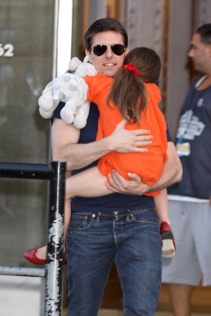 Tom Cruise and daughter Suri leaving Chelsea Piers, after spending the day (July 17) together for the first time since his divorce from Katie Holmes