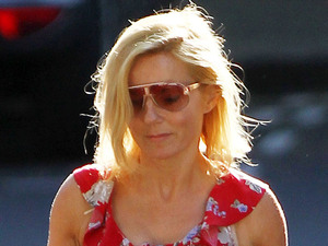 Geri Halliwell gets into the summer spirit by wearing a floral dress while out and about in North London
