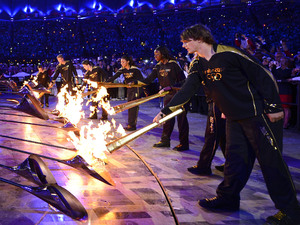 The Olympic Cauldron is lit.
