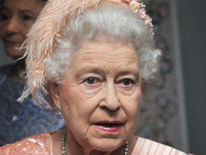 The queen arriving at the Opening Ceremony