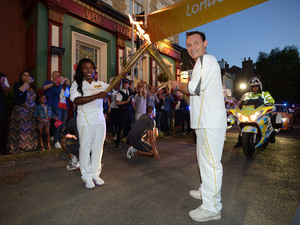 Billy Mitchell (Perry Fenwick) carrying the Olympic Torch on 23rd July 2012