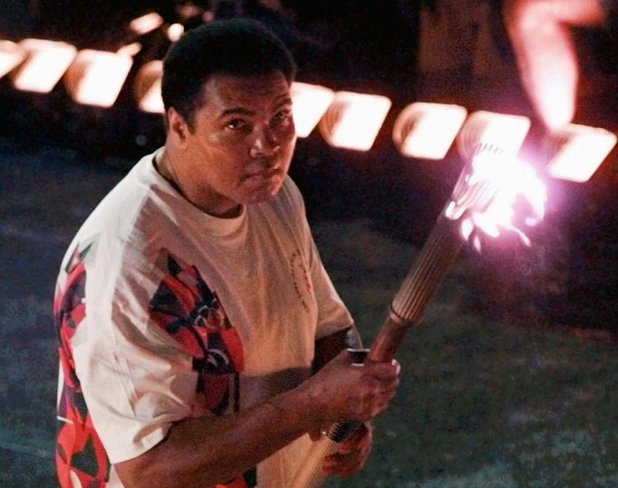 Muhammad Ali lights the Olympic flame in Atlanta - July 19, 1996 (PA green label)