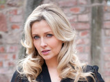 Gemma Merna as Carmel McQueen on Hollyoaks