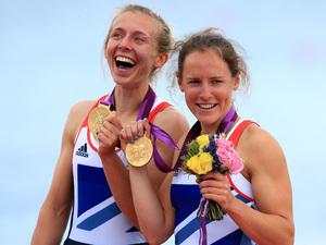 Great Britain's Sophie Hosking and Katherine Copeland celebrate winning gold in the final of the lightweight women's double sculls.