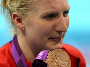 Great Britain's Rebecca Adlington cries after the medal ceremony for the Women's 800m Freestyle at the Aquatics Centre in the Olympic Park, London, on the seventh day of the London 2012 Olympics.