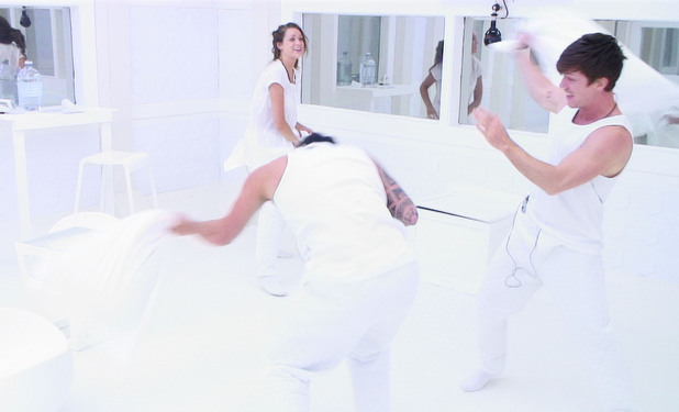 Conor, Sara and Luke S having a pillow fight
