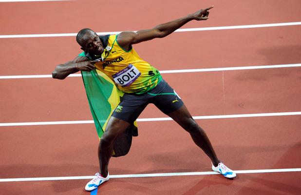 Jamaica's Usain Bolt celebrates winning the men's 100m final.