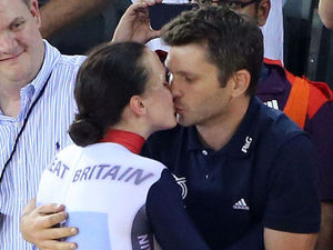 Victoria Pendleton, kisses her fiance Scott Gardner after winning the Gold medal in the Women's Keirin