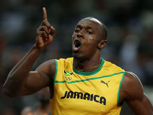 Usain Bolt crossing the line in the 100m final at the London 2012 Olympic games (PA green label)