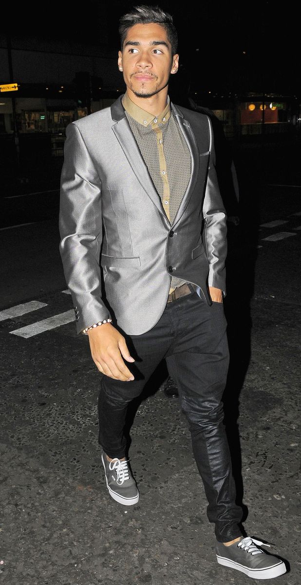 Gymnast Louis Smith leaves The Rose Club in London.