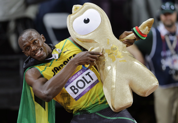 Jamaica's Usain Bolt celebrates winning gold in the men's 100-meter final
