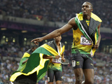 Usain Bolt celebrates his victory in the men's 200m final