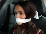 Mercedes is gagged and bound.