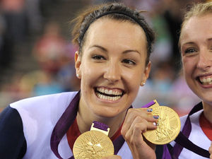 Dani King, Laura Trott and Joanna Rowsell celebrate after winning the Women's Team Pursuit Final