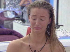 Danica cries in the bedroom.
