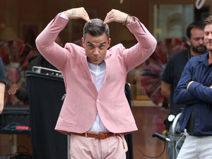 Robbie William filming his new music video